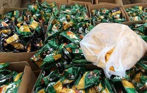 The Supply Department in Al-Hasaka examine the products of chips factory .